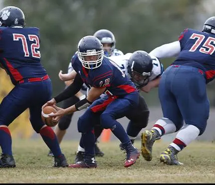 American football players during a game.